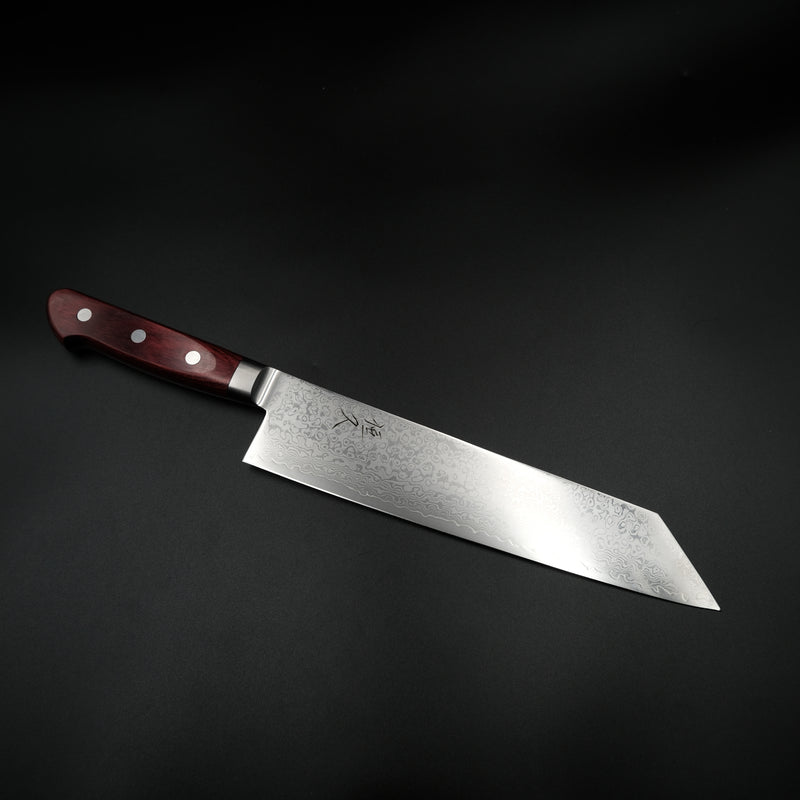 Tsunehisa VG-10 Kiritsuke Damascus çelik deseni ve kırmızı saplı bıçağın açılı görünümü